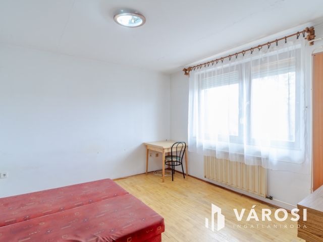 Tégla lakás Móraváros szívében