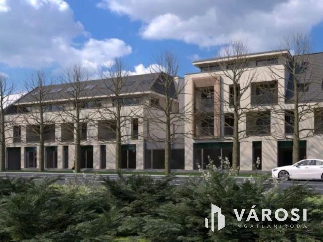 Belvárosi, új lakás hatalmas  loggiával  eladó